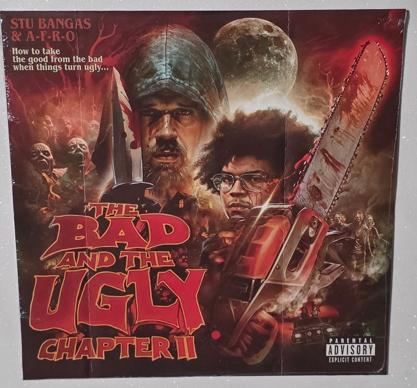 A-F-R-O X Stu Bangas – The Bad And The Ugly Chapter II (2026) (Limited Edition Clear Red with Black Swirl Colour Vinyl LP)