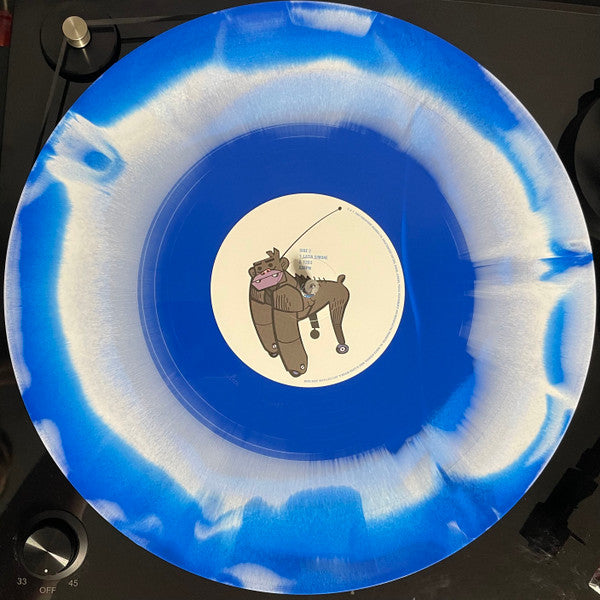 Gorillaz – Tomorrow Comes Today (2025) (Limited Edition White & Blue Colour-in-Colour Vinyl LP)