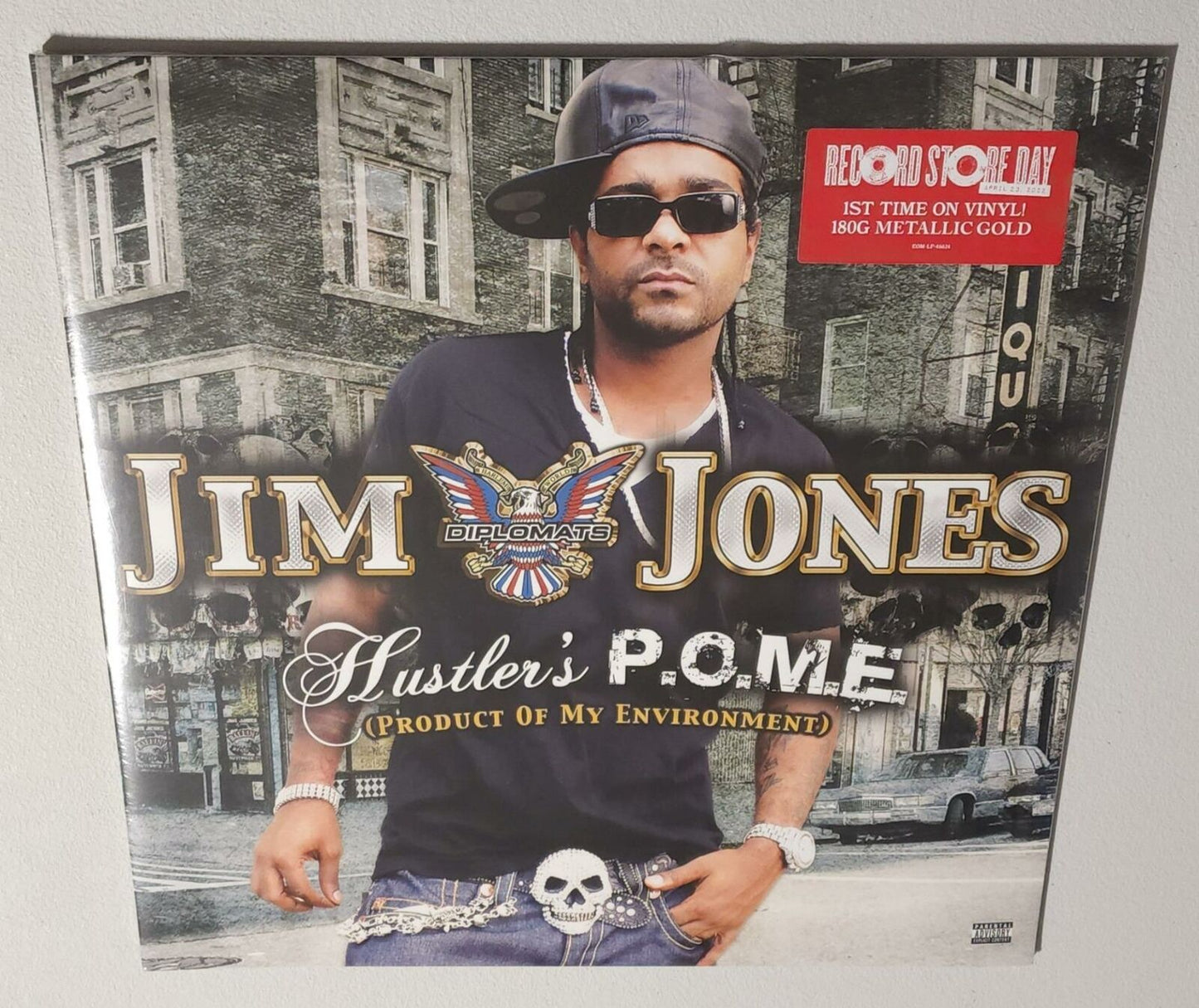 Jim Jones – Hustler's P.O.M.E. (Product Of My Environment) (2022 RSD) (Limited Edition Metallic Gold Colour Vinyl LP)