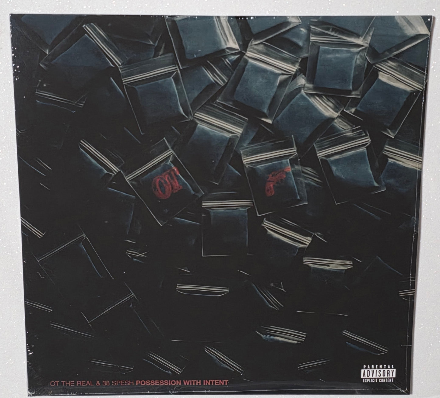 OT The Real x 38 Spesh - Possession With Intent (2026) (Limited Edition White With Red and Black Splatter Vinyl LP)