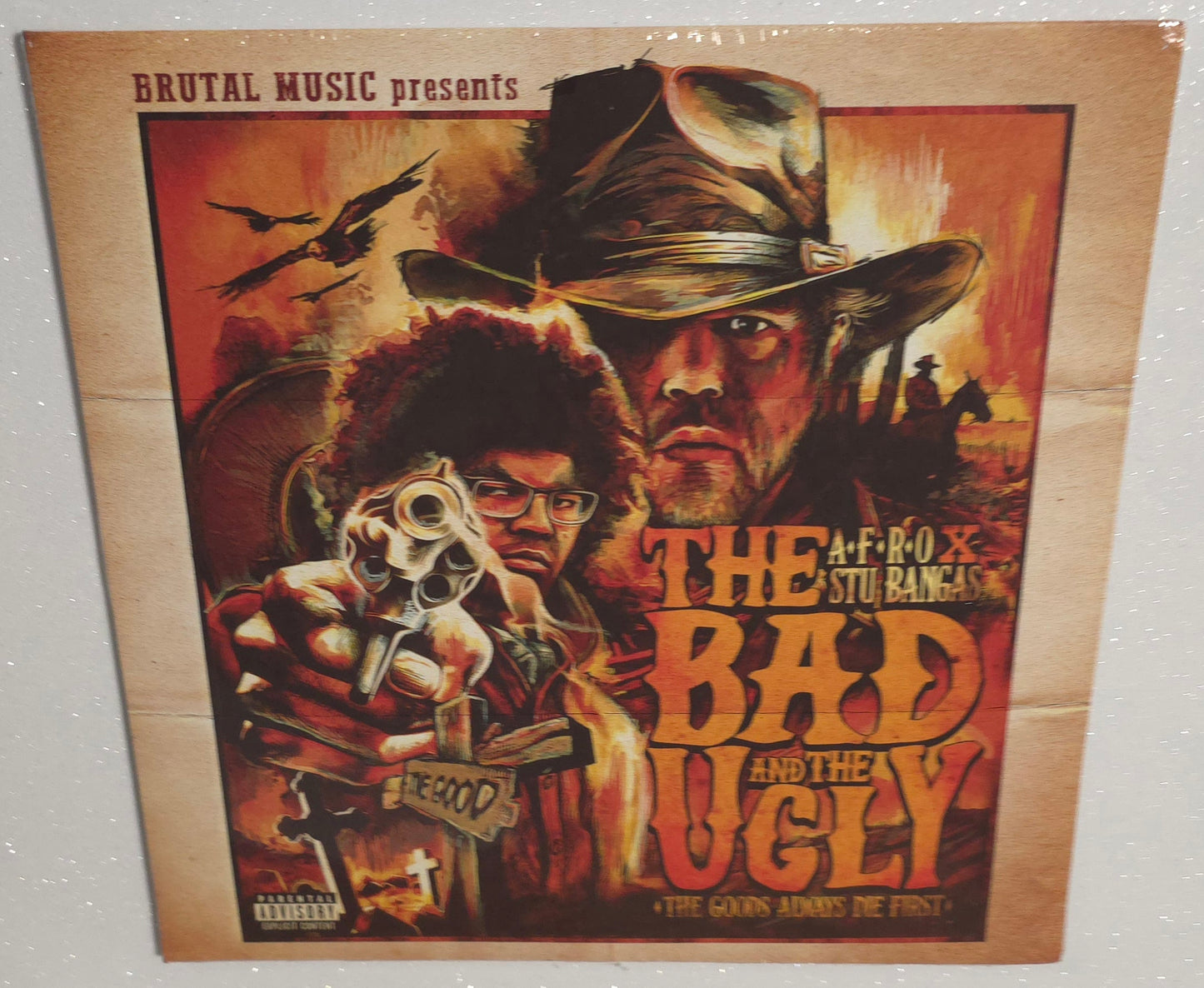A-F-R-O X Stu Bangas – The Bad And The Ugly - The Goods Always Die First (2024) (Limited Edition Tangerine Sunset Colour Vinyl LP)