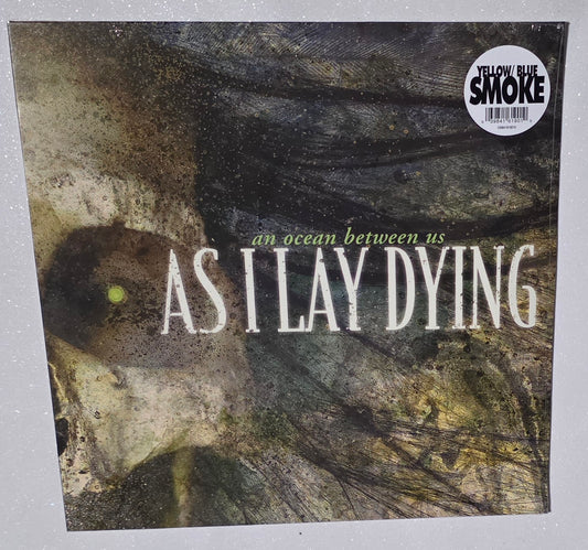 As I Lay Dying – An Ocean Between Us (2026 Reissue) (Limited Edition Yellow & Blue Smoke Colour Vinyl LP)