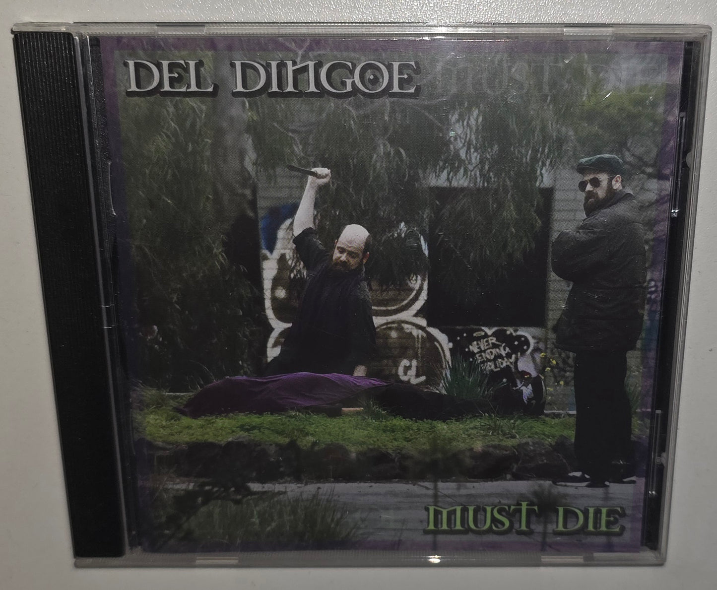 Del Dingoe – Must Die (2015) (CD)