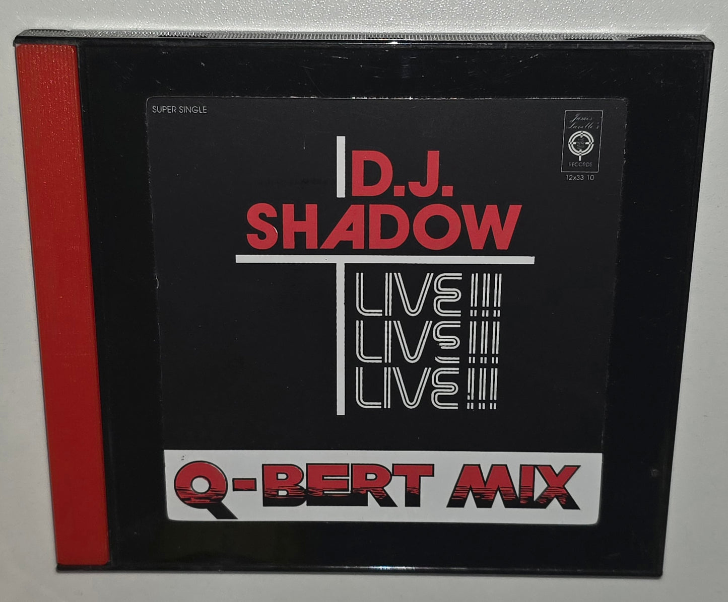 D.J. Shadow – Q-Bert Mix (Live!!!) (1997) (CD)