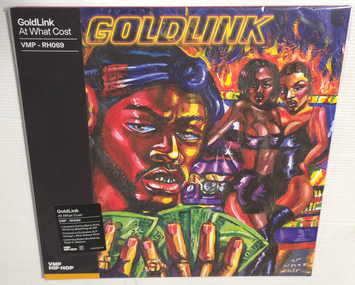 GoldLink – At What Cost (2023) (VMP Limited Edition Blue & Orange Galaxy Colour Vinyl LP)