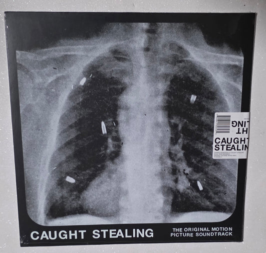 Idles & Rob Simonsen – Caught Stealing (The Original Motion Picture Soundtrack) (2025) (Limited Edition Bone White Colour Vinyl LP)