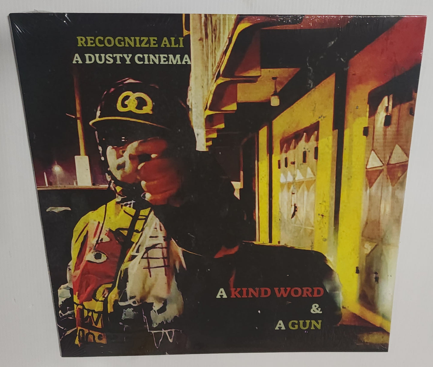 Recognize Ali / A Dusty Cinema – A Kind Word & A Gun (2024) (Limited Edition Yellow with Black Splatter Colour Vinyl LP)