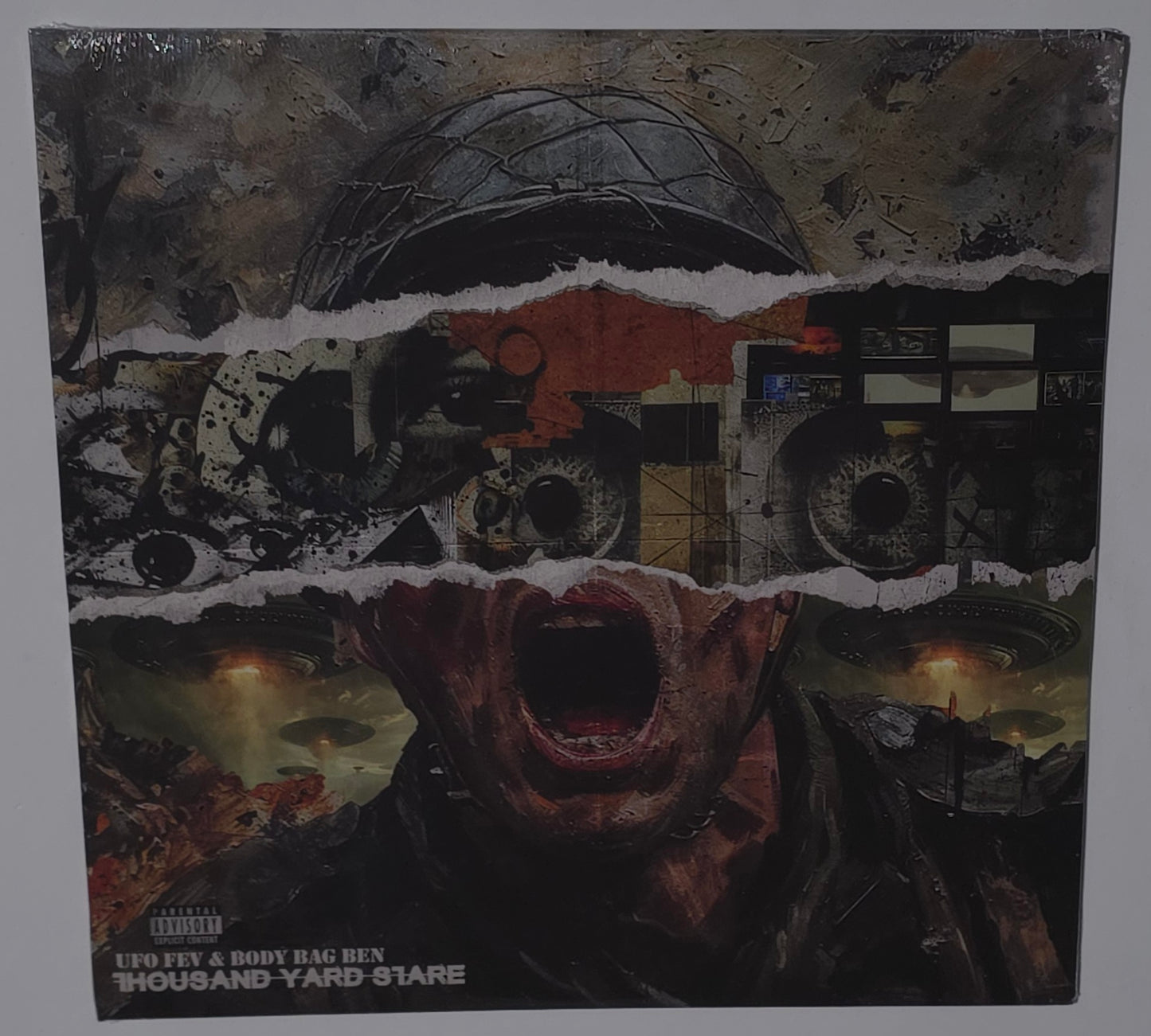 UFO FEV & Body Bag Ben – Thousand Yard Stare (2025) (Limited Edition  Army Green with Black & Brown Swirl Colour Vinyl LP)